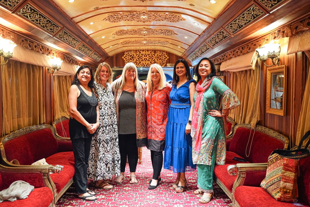 Luxury train travelers socializing and making new friends